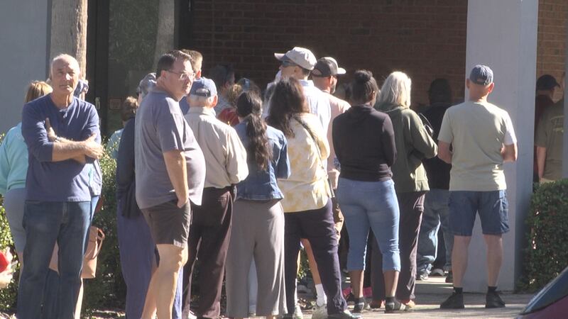 Alachua County elections workers say voters are turning out in large numbers on the first day...
