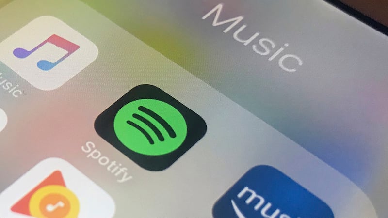 FILE - Music streaming apps, clockwise from top left, Apple, Spotify, Amazon and Google are...