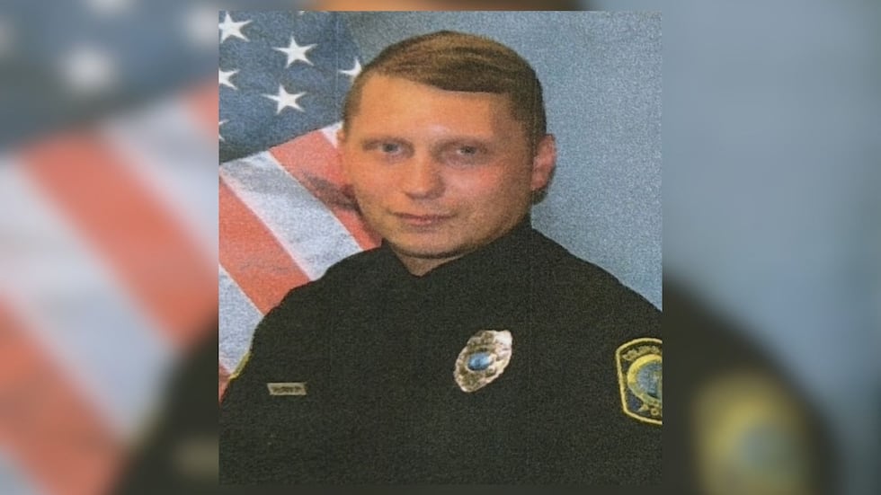Officer and suspect killed, another injured in shooting