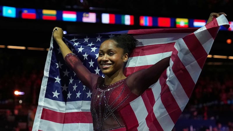 Skye Blakely, of the United States, celebrates after winning the gold medal in the women's...