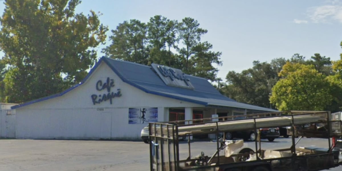 Cafe Risque Sign Cafe Risque, other clubs challenge new Florida law